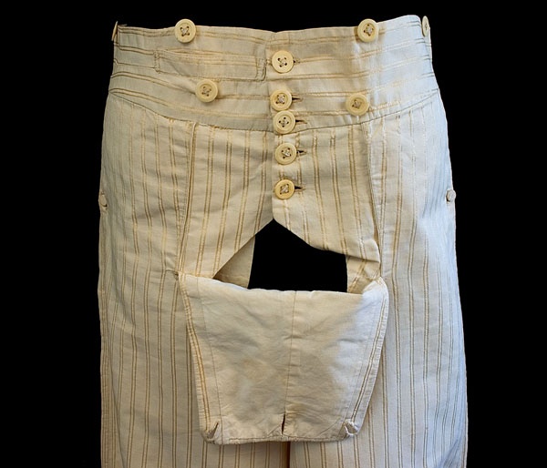A photograph of front  fall trousers showing the buttoning method
